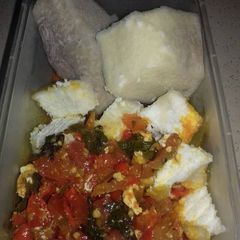 A picture of Boiled yam with fresh pepper sauce.