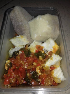 A picture of Boiled yam with fresh pepper sauce.