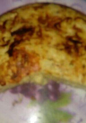 Una foto de Tortilla de papas ralladas y cebollas