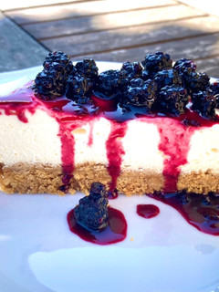 Foto di Cheesecake con topping di more
