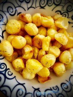 Una foto de Bolitas de patatas al romero (al horno)