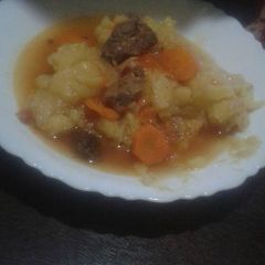 A picture of Plain tain with beef stew.