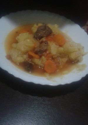 A picture of Plain tain with beef stew.