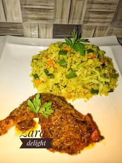 A picture of Vegetable couscous with tandoori chicken.