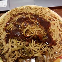 A picture of Wholewheat pasta served with berbeque sauce.