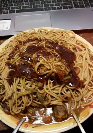 A picture of Wholewheat pasta served with berbeque sauce.