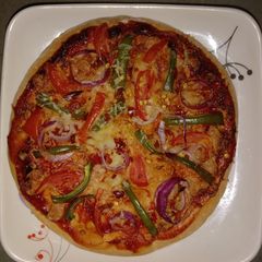A picture of Onion Capsicum PIZZA Italian Cuisine.