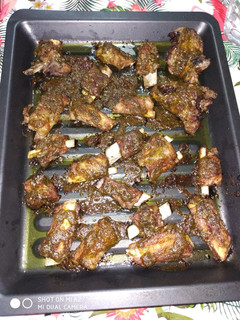 Una foto de Costillas al horno con miel y curry