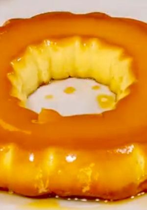 Una foto de FLAN de naranja