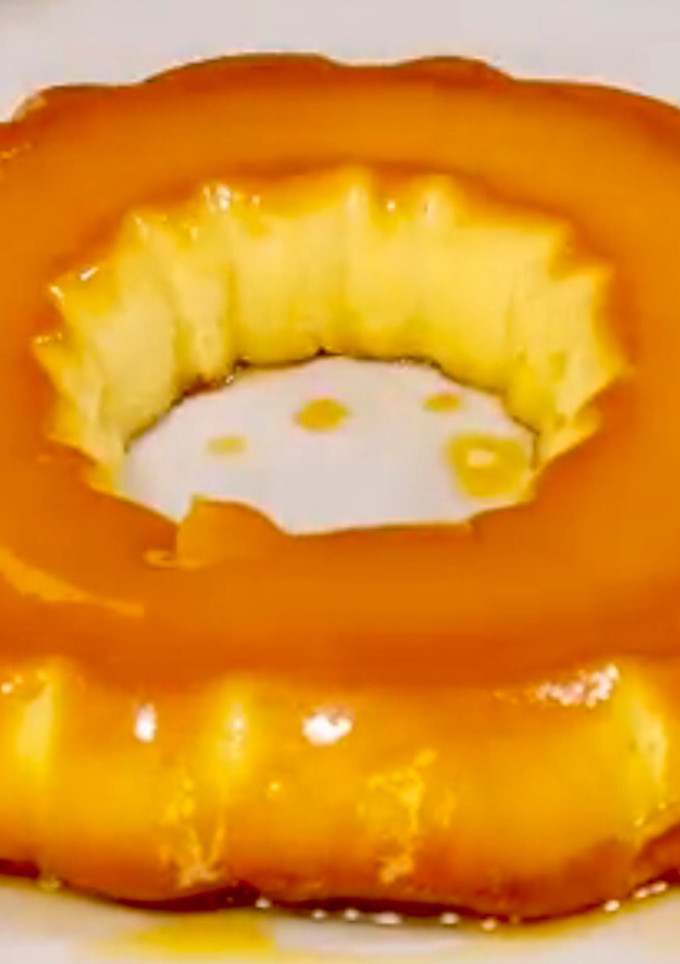Una foto de FLAN de naranja