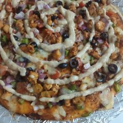 Chicken tikka flavour 🍕 A picture of Chicken tikka flavour 🍕.