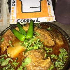 A picture of Aloo gosht.