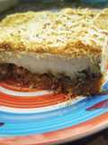 Pastel de carne mixto con crocante de pan al romero