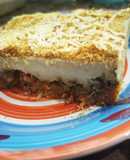 Pastel de carne mixto con crocante de pan al romero