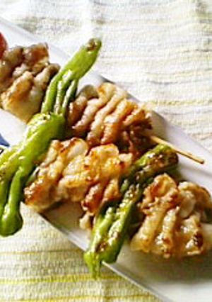 A picture of Skewers with Pork Belly Slices.