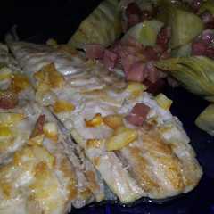 Una foto de Jurel al ajillo con alcachofas salteadas con jamon..,