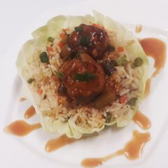 Fried rice with veg manchurian A picture of Fried rice with veg manchurian.