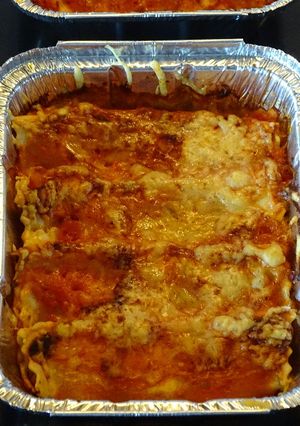 Una foto de Canelones con atún y verduras