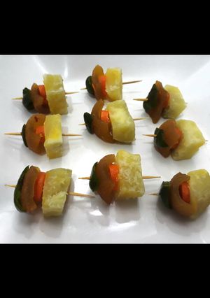 A picture of Sweet potatoes with pomo,carrots and green pepper.