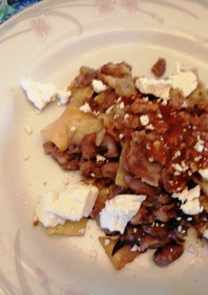Una foto de Migas con frijol y queso