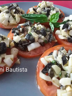 Una foto de Tomate aliñado