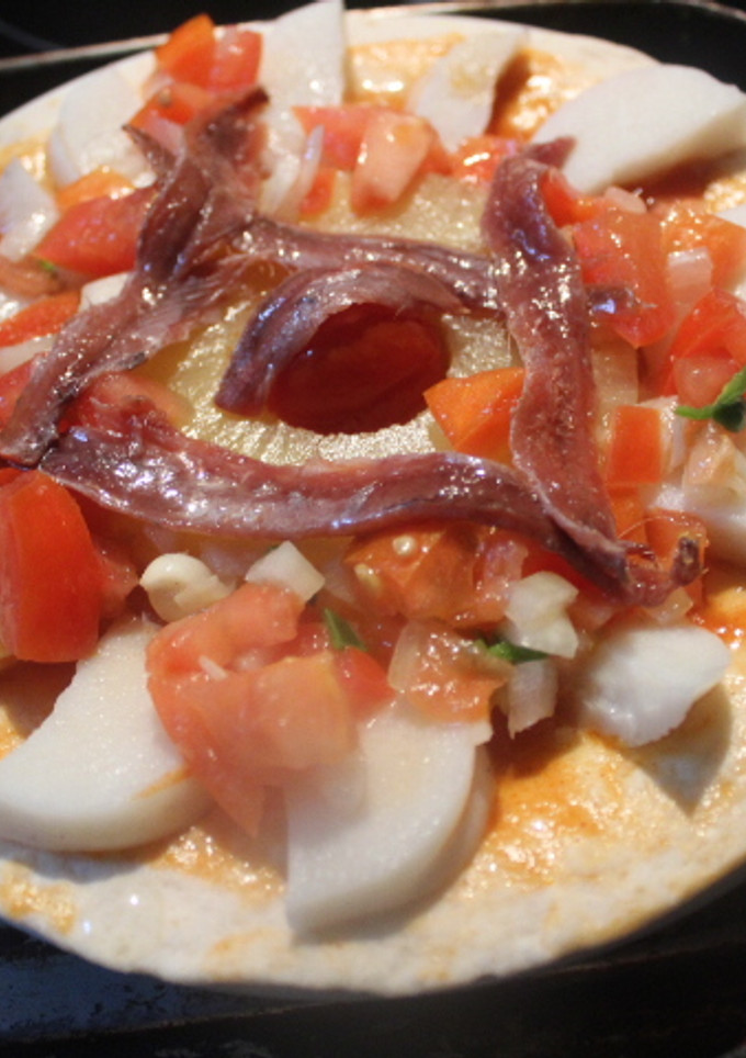 Una foto de Tortitas mexicanas con complejo de pizzas marineras