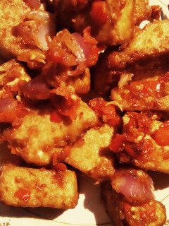 A picture of Tofu with sauce.