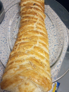 Una foto de Trenza de jamón y queso