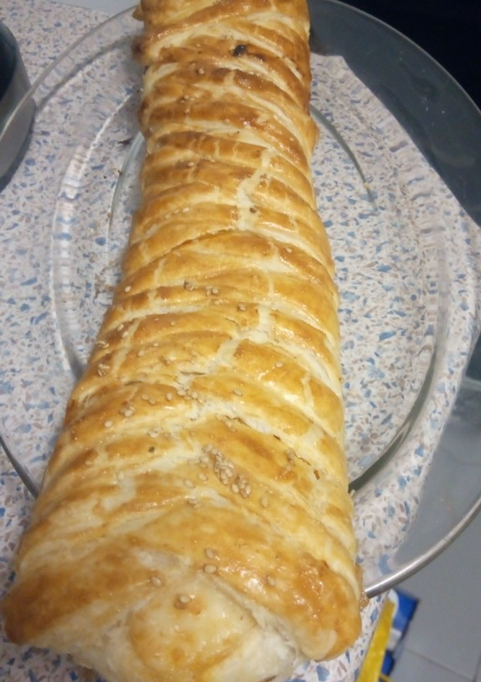 Una foto de Trenza de jamón y queso