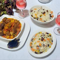 A picture of Butter veg rice with Italian meat ball and potato soup.