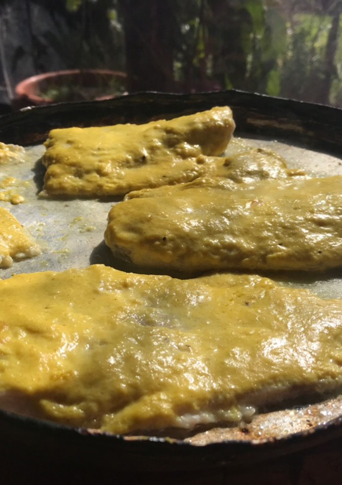 Una foto de Merluza al curry y cúrcuma