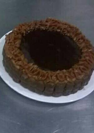 Una foto de Torta clásica de dulce de leche😍