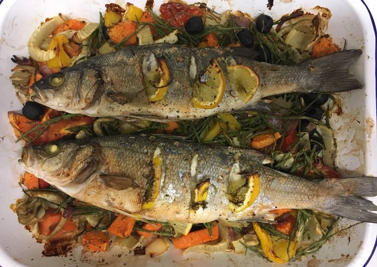 Roast seabass on a bed of roasted vegetables and samphire
