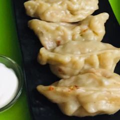 A picture of Steamed Momos.