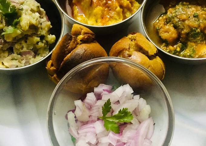 Exotic Sattu Bati with lavish Tamatar and Aloo Chokha And Masala Dal