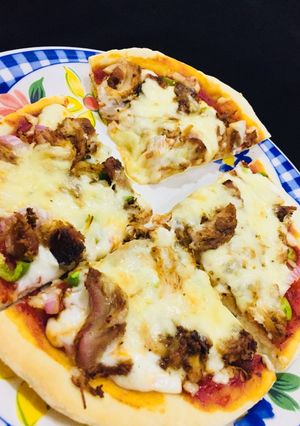 A picture of Creamy Tikka pizza.
