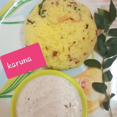 A picture of Lemon rice with coconut chutney.
