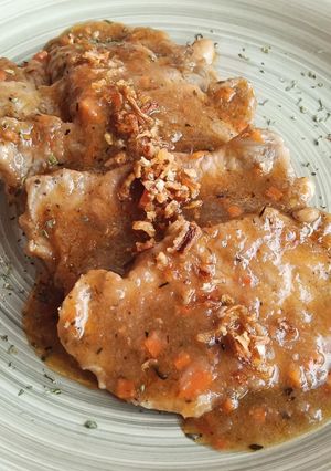 Una foto de Lomo en salsa