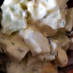 A picture of Hard boiled eggs and kiwi dill salad.