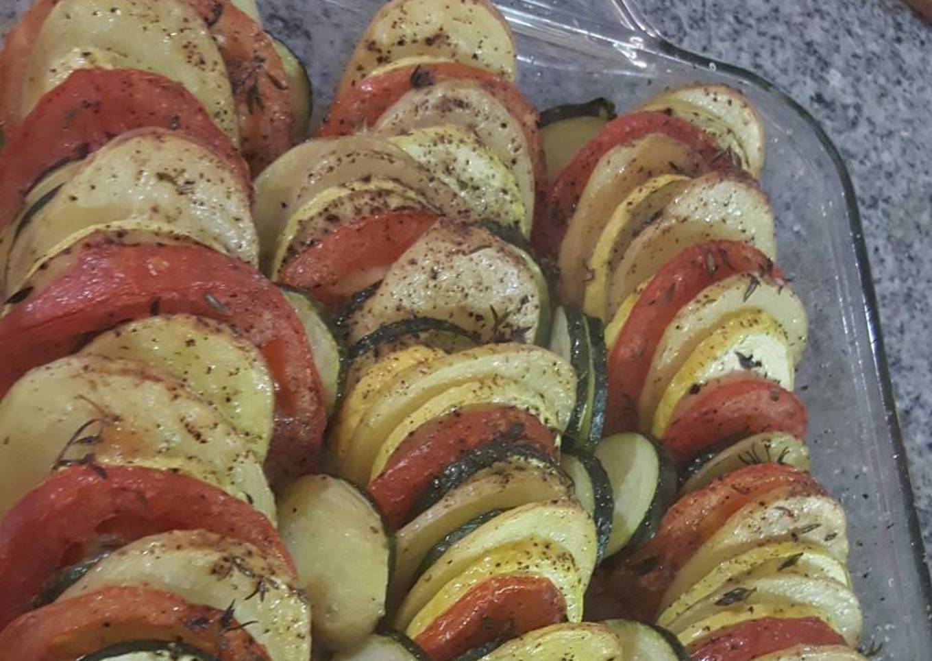 Baked potatoes, zucchini, yellow zucchini, tomato