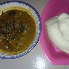 A picture of Bitter leave soup and poundo yam.