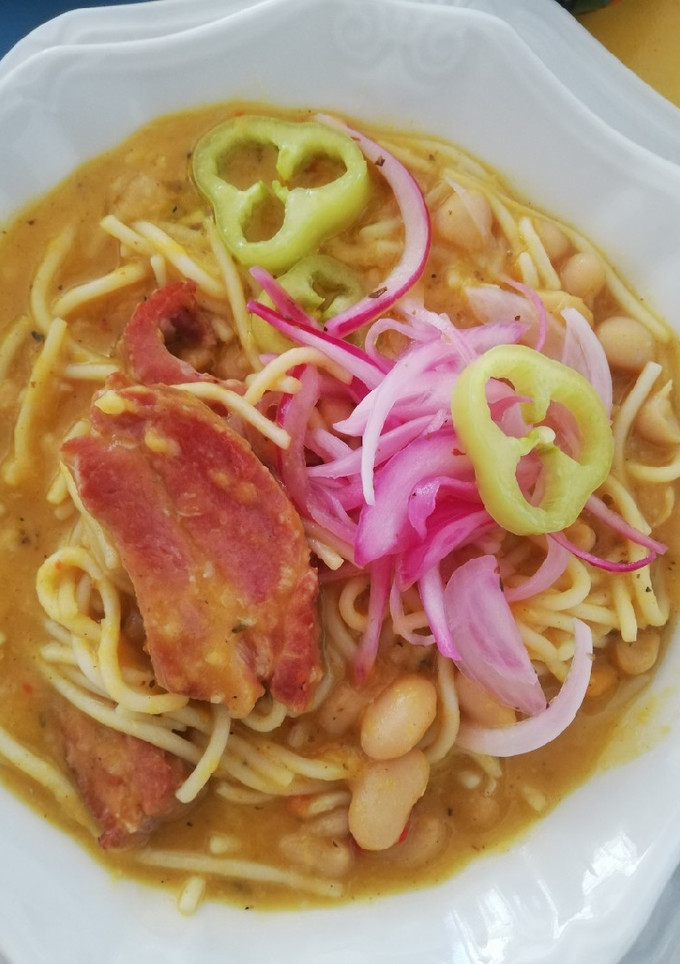 Una foto de Porotos con rienda y costillar ahumado