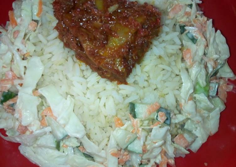 White rice and salad and Stew chicken