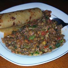 A picture of Lentils with chapati.