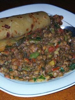 A picture of Lentils with chapati.