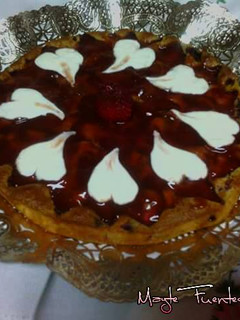 Una foto de Tarta de queso y fresas