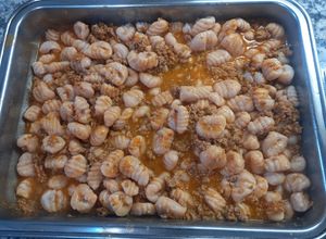 Una foto de Ñoquis de Mortadela con Salsa Bolognesa