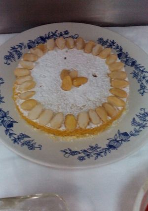 Una foto de Pastel de polenta y almendras italiano