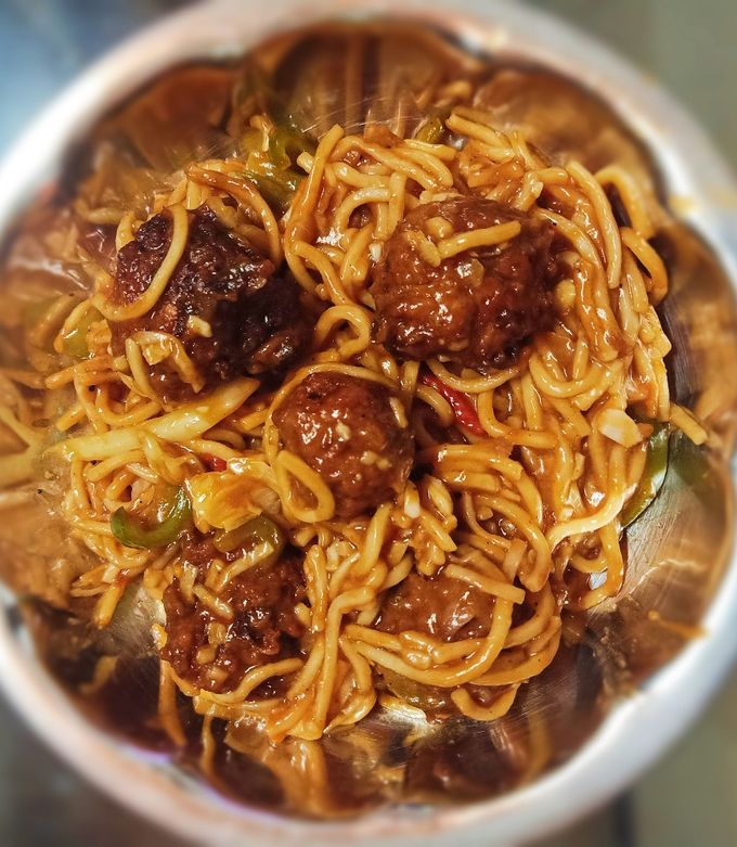 A picture of Veg Manchurian noodles 😋.