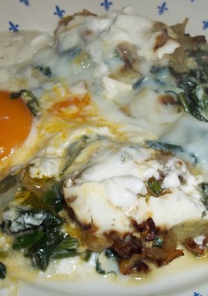 Foto principal de Huevos en nido de espinacas